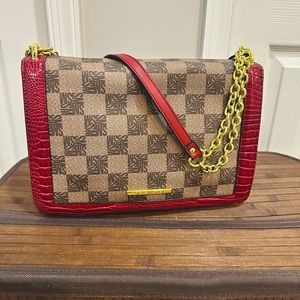 Never before worn Monogram leather bag; STEVE MADDEN